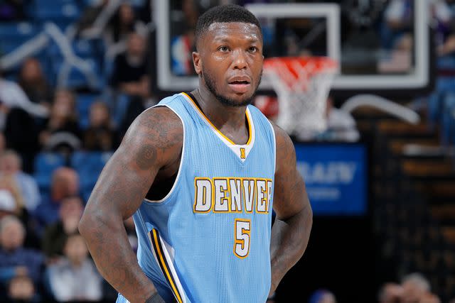 <p>Rocky Widner/NBAE via Getty</p> Nate Robinson plays as part of the Denver Nuggets on January 9, 2015