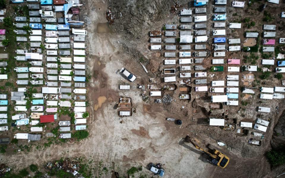 A picture taken with a drone of new graves construction in a pantheon in the Acapulco resort, Guerrero state, Mexico, 06 August 2021. The Ministry of Health of Mexico reported this 06 August 21,563 new confirmed infections of covid-19, for a total of 2,944,226 cases, in addition to 568 new deaths, reaching 243,733 deaths, in the middle of the third wave of the pandemic. Mexico reports 21,563 new infections, third highest number in the pandemic, Acapulco - - Shutterstock