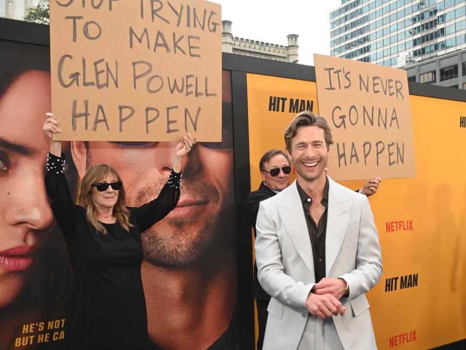 Glen Powell and his parents attend the premiere of Netflix's "Hit Man" his induction into The Texas Film Hall of Fame The Paramount Theatre on May 15, 2024 in Austin, Texas