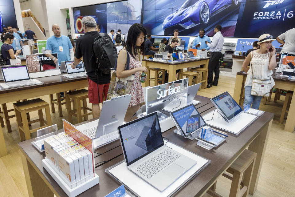 Laptops on display inside Microsoft on Fifth Avenue. (Photo by: Jeffrey Greenberg/Universal Images Group via Getty Images)