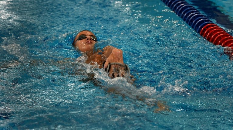 Paralympic swimmer Alexander Makarov swims during a training session in the town of Ruza, 100 km west of Moscow, on August 18, 2016