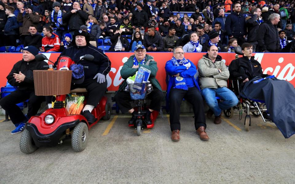 Leicester City supporters watch their team at the King Power Stadium - PA Archive