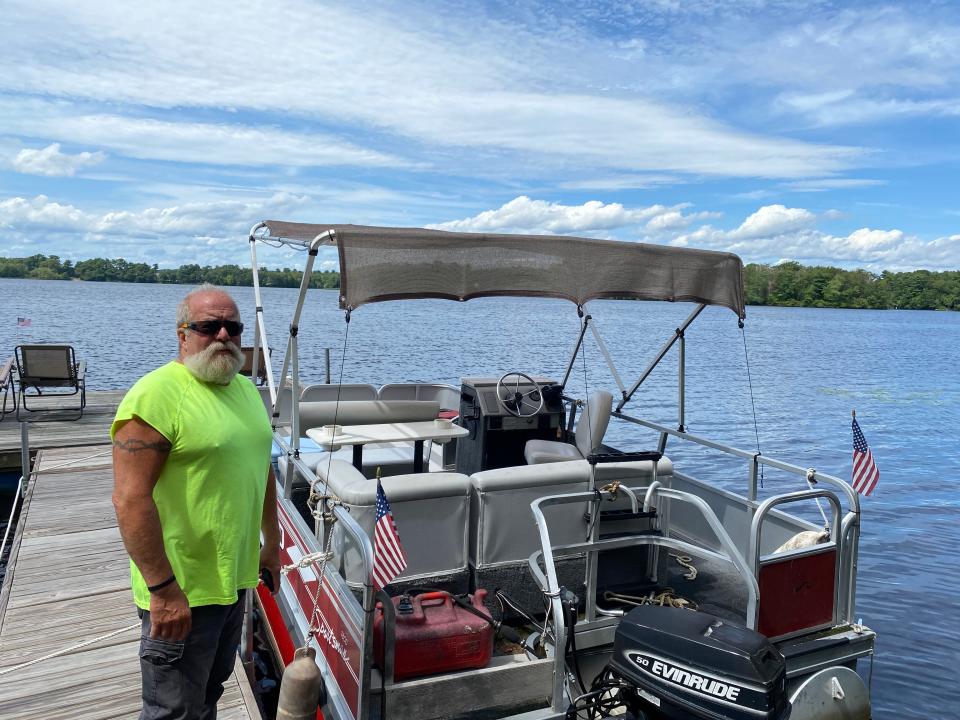 Craig Demoura, longtime resident of Lake Sabbatia in Taunton, with his boat on Monday, Aug. 14, 2023, said it's the worst he's ever seen for unruly behavior on the lake.