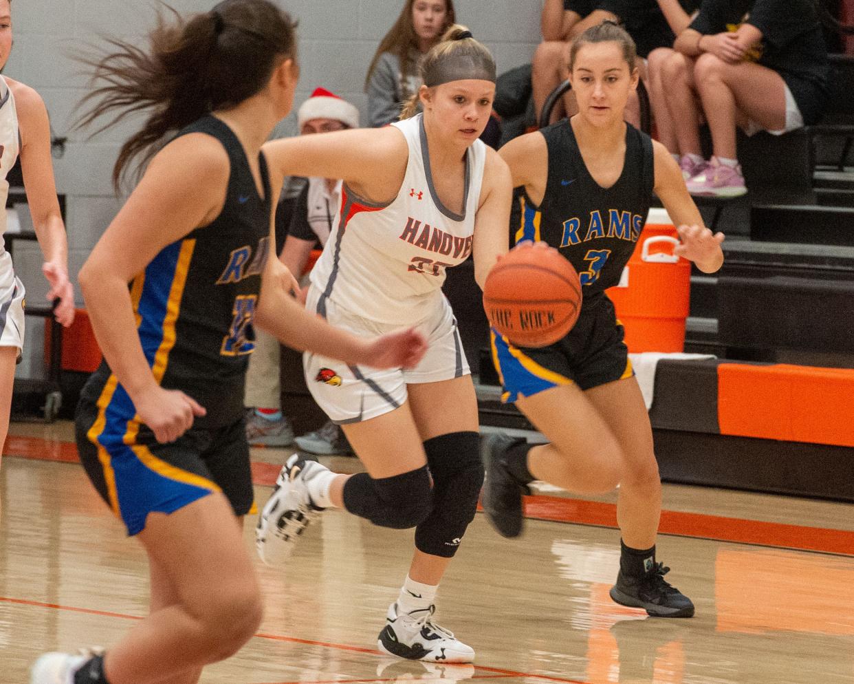 Hanover’s Riley Stigler moves the ball upcourt after taking it away from Kennard-Dale in the first round of the Hanover Hawkettes Holiday Classic on Tuesday, Dec. 27, 2022. The Rams won 32-30.