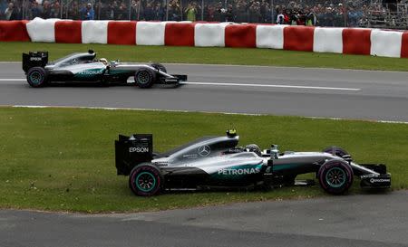 Formula One - Canadian Grand Prix - Montreal, Quebec, Canada - 12/6/16 - Mercedes F1 drivers Nico Rosberg of Germany and Lewis Hamilton of Britain drive. REUTERS/Chris Wattie