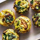 <p>Switch up your morning routine with these easy vegetarian mini quiches. Earthy mushrooms and spinach pair nicely with rich and creamy Gruyère cheese. Serve them on a platter with a fresh fruit salad for a simple weekend brunch. <a href="https://www.eatingwell.com/recipe/278909/muffin-tin-spinach-mushroom-mini-quiches/" rel="nofollow noopener" target="_blank" data-ylk="slk:View Recipe;elm:context_link;itc:0;sec:content-canvas" class="link ">View Recipe</a></p>