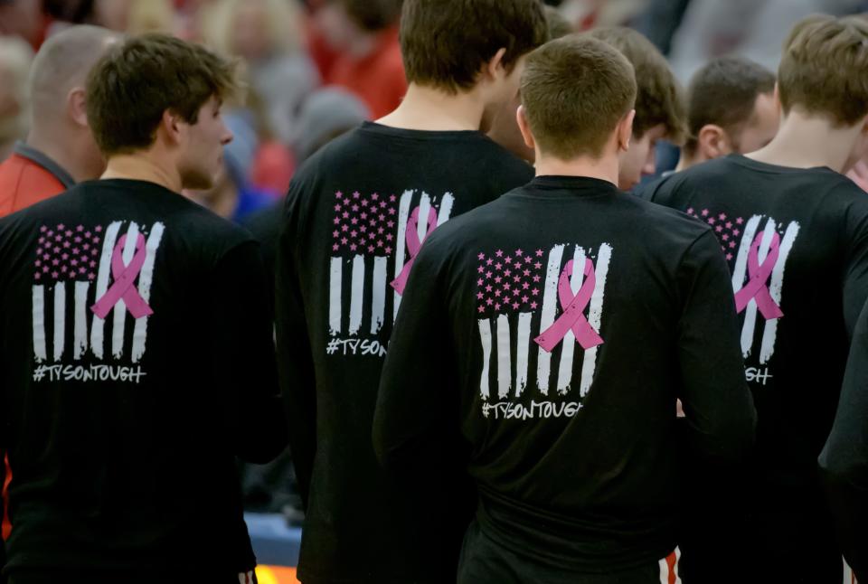 The Metamora Redbirds sport special warm-up shirts at their game against  Sacred Heart-Griffin on Monday, Jan. 16, 2023 at UI-Springfield. The Redbirds defeated the defending 3A state champion Cyclones 60-50.