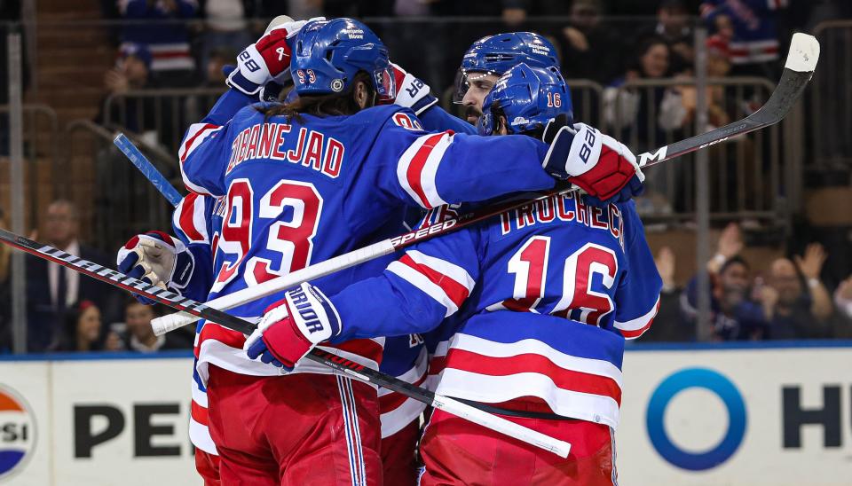 Apr 11, 2024; New York, New York, USA; New York Rangers left wing Artemi Panarin (10) celebrates his goal with center Mika Zibanejad (93), left wing Chris Kreider (20) and center Vincent Trocheck (16) during the first period against the Philadelphia Flyers at Madison Square Garden.