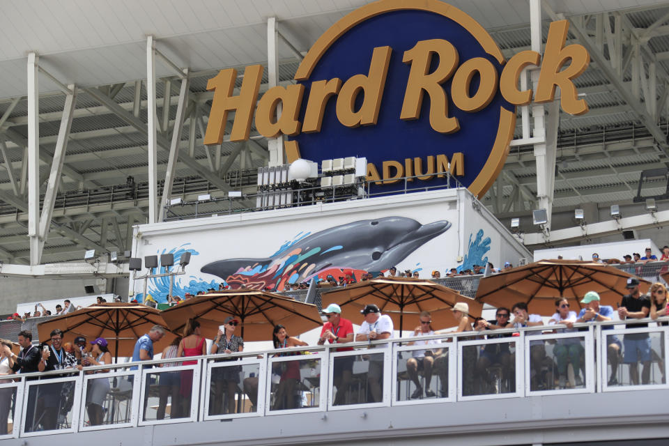 MIAMI GARDENS, FL - MAY 08: Fans watch pre race activities under the Hard Rock Stadium logo prior to the Formula 1 CRYPTO.COM Miami Grand Prix on May 8, 2022 at Miami International Autodrome in Miami Gardens, FL.(Photo by Jeff Robinson/Icon Sportswire via Getty Images)