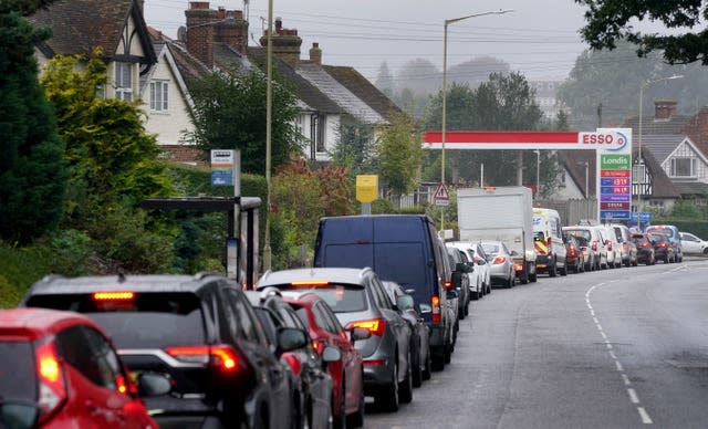 Motorists queue for fuel at an Esso petrol station in Ashford, Kent