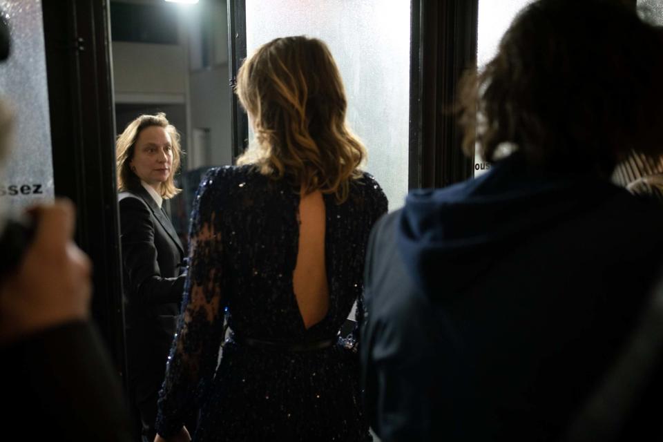 Celine Sciamma (centre) and Adele Haenel (right) leave the Salle Pleyel after the award for best director was announced (Getty Images)