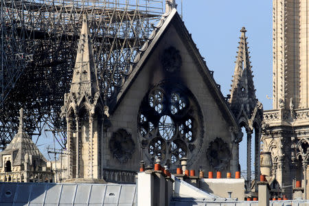 A view shows a damaged section of Notre-Dame Cathedral after a massive fire devastated large parts of the gothic structure in Paris, France, April 17, 2019. REUTERS/Gonzalo Fuentes