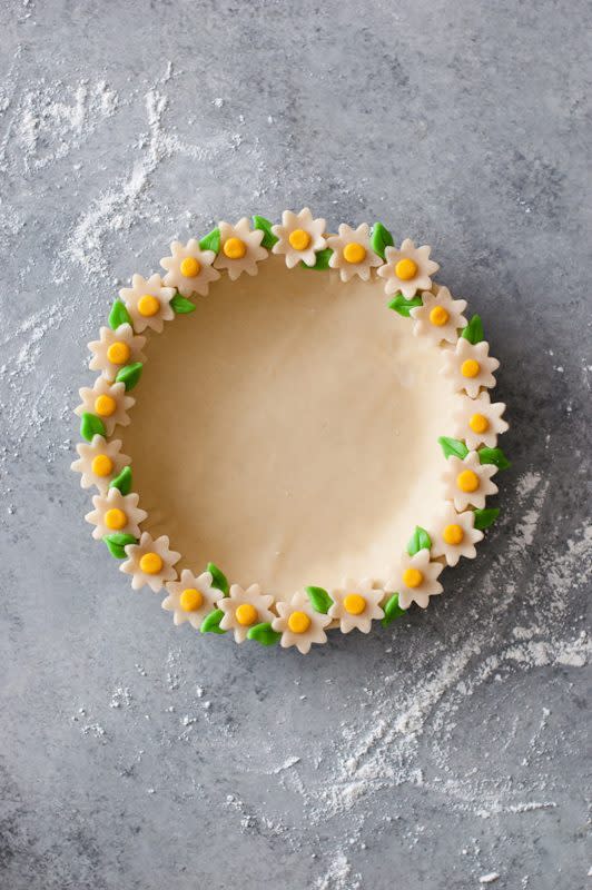 <p>Handmade Charlotte</p><p>Making pie might be boring for some kids, but not if you give them the task of creating a floral crust for it! Follow the tutorial for daisy chain piecrust at <a href="https://www.handmadecharlotte.com/daisy-chain-pie-crust-tutorial/" rel="nofollow noopener" target="_blank" data-ylk="slk:Handmade Charlotte;elm:context_link;itc:0;sec:content-canvas" class="link "><em>Handmade Charlotte</em></a> for an activity kids will love!</p>