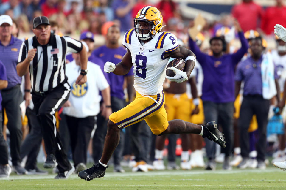 Sep 30, 2023; Oxford, Mississippi, USA; LSU Tigers wide receiver Malik Nabers (8) runs after a catch during the first half against the Mississippi Rebels at Vaught-Hemingway Stadium. Mandatory Credit: Petre Thomas-USA TODAY Sports