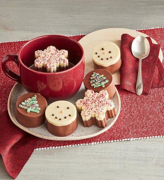 <p><strong>Harry & David</strong></p><p>harryanddavid.com</p><p><strong>$49.99</strong></p><p>Drop these holiday-inspired hot cocoa bombs into a mug full of warm milk and watch them melt. The end result: rich hot chocolate, loaded with mini marshmallows, peppermint bits and glimmers of festive cheer (red and green sprinkles). </p>