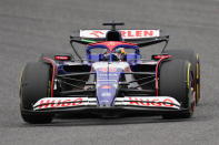 Ayumu Iwasa of Japan, driver of RB, the team previously known as AlphaTauri takes part in the first free practice session at the Suzuka Circuit in Suzuka, central Japan, Friday, April 5, 2024, ahead of Sunday's Japanese Formula One Grand Prix. (AP Photo/Hiro Komae)