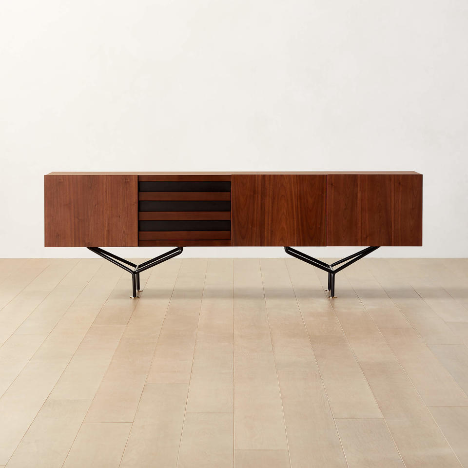 <p><a href="https://go.redirectingat.com?id=74968X1596630&url=https%3A%2F%2Fwww.cb2.com%2Fparaggi-walnut-wood-credenza%2Fs108166&sref=https%3A%2F%2Fwww.harpersbazaar.com%2Ffashion%2Ftrends%2Fg44724050%2Fbest-mid-century-modern-furniture%2F" rel="nofollow noopener" target="_blank" data-ylk="slk:Shop Now;elm:context_link;itc:0;sec:content-canvas" class="link ">Shop Now</a></p><p>Paraggi Walnut Wood Credenza</p><p>cb2.com</p><p>$2499.00</p>