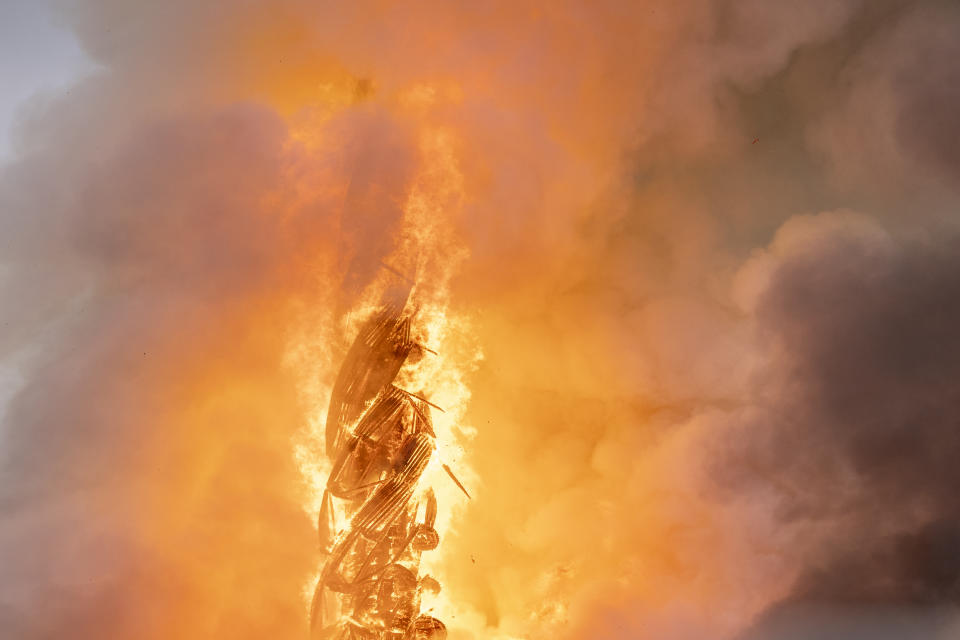 Fire rages from the dragon spire of the Stock Exchange in Copenhagen, Denmark, Tuesday, April 16, 2024. A fire raged through one of Copenhagen’s oldest buildings on Tuesday, causing the collapse of the iconic spire of the 17th-century Old Stock Exchange as passersby rushed to help emergency services save priceless paintings and other valuables. (Ida Marie Odgaard/Ritzau Scanpix via AP)