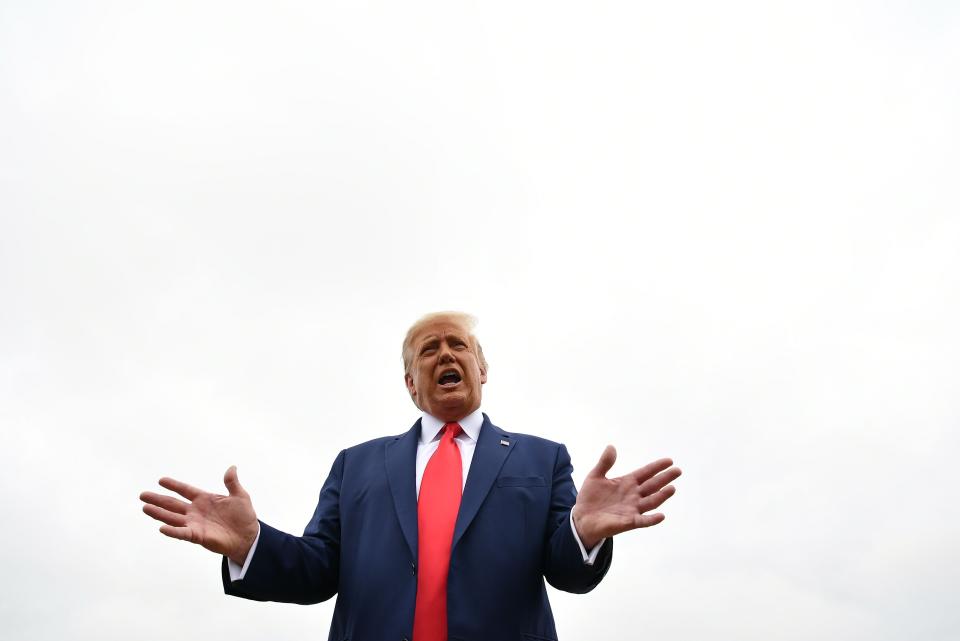 President Trump speaks to the media departing from Andrews Air Force Base in Maryland for Kenosha, Wisc., on Sept. 1. (Photo by Mandel Ngan/AFP via Getty Images)