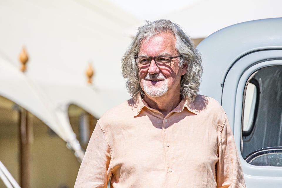 The Grand Tour and former Top Gear presenter, television personality James May standing in front of a vintage Chevrolet in the sunshine while visiting the Chalke History Festival to give his talk entitled 'The Car: Did we get it wrong?' with James Holland. Credit John Rose/Alamy Live News