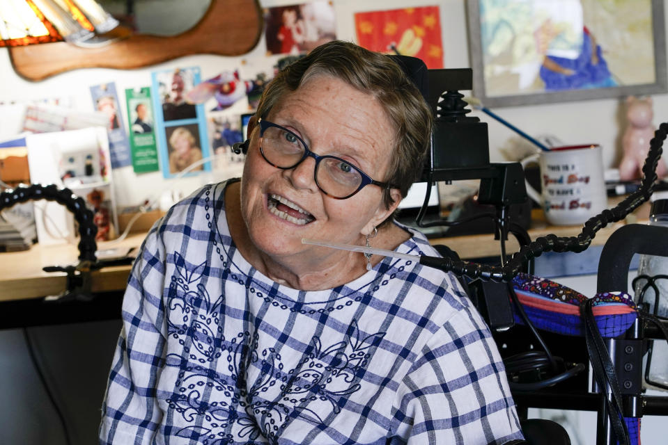 Martha Chambers pose in her apartment Friday, Sept. 2, 2022, in Milwaukee. Wisconsin voters with disabilities are celebrating a win after a federal judge, citing the Voting Rights Act, ruled that they may get assistance returning their ballots. (AP Photo/Morry Gash)