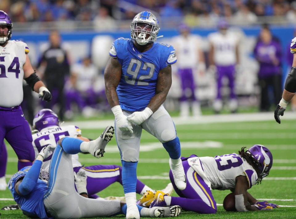 Detroit Lions defensive tackle Kevin Strong celebrates a tackle on Minnesota Vikings running back Dalvin Cook during the second half Sunday, Oct. 20, 2019 at Ford Field.