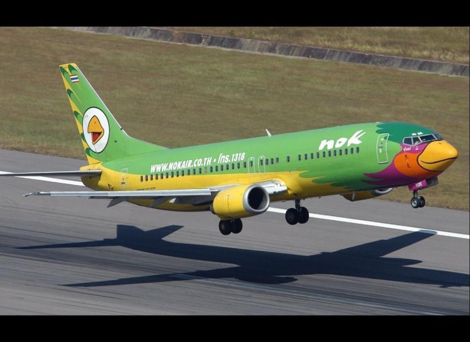 This Nok Air jet from Thailand takes color and self-promotion to the extreme.    <em>Photo: Sam Chui</em>