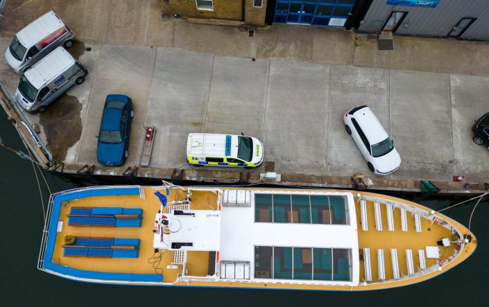 Police guard the impounded pleasure boat - Getty Images