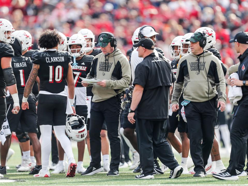 Louisville's Jeff Brohm during a timeout in the game against Virginia Tech. Nov. 4, 2023