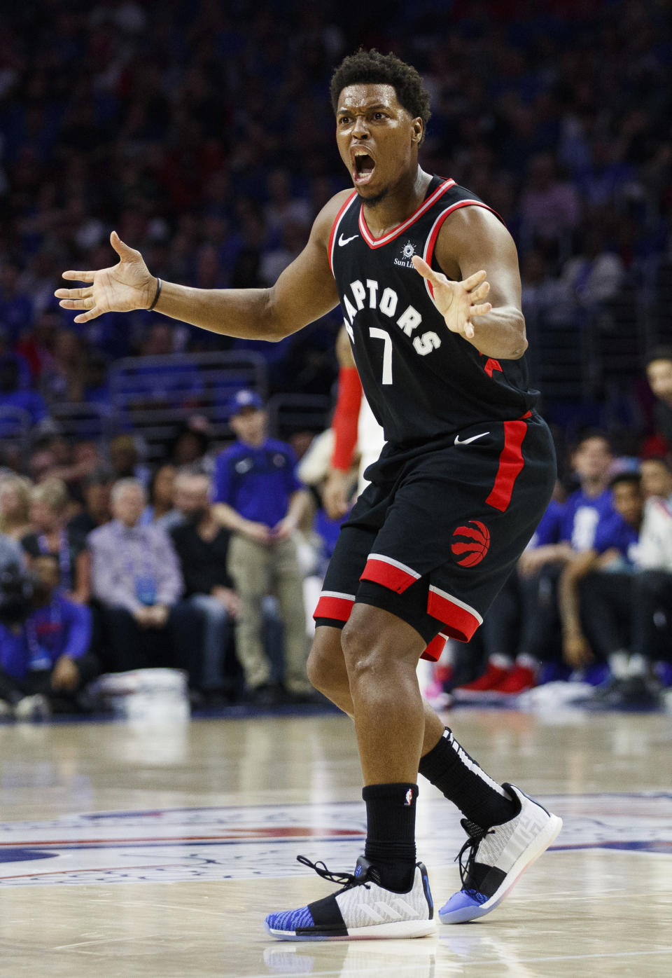 Toronto Raptors' Kyle Lowry reacts to a call during the first half of Game 3 of the team's second-round NBA basketball playoff series against the Philadelphia 76ers, Thursday, May 2, 2019, in Philadelphia. The 76ers won 116-95. (AP Photo/Chris Szagola)