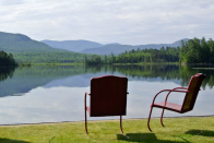 <p>The view of the Adirondacks is breathtaking. <br> The island was originally developed by a local businessman in the early 1920s. <br> (Airbnb) </p>