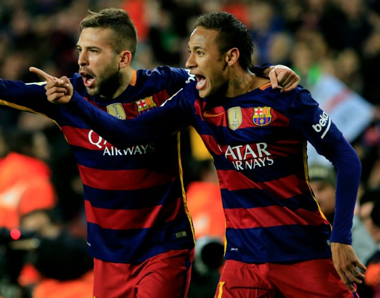 Barcelona's Neymar (R) celebrates with Jordi Alba after scoring during the Copa del Rey match against Espanyol at Camp Nou stadium on January 6, 2016