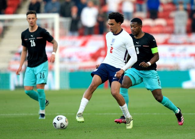 Trent Alexander-Arnold passes the ball