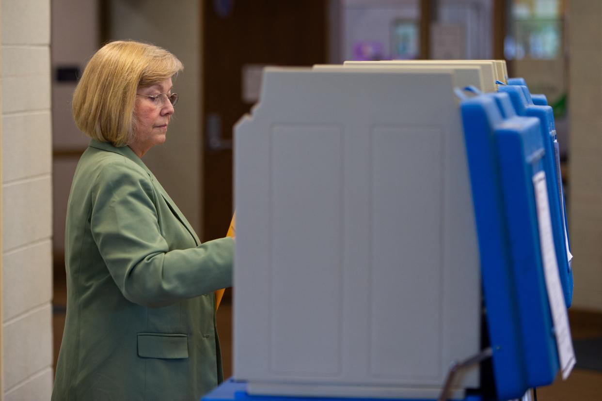 Colette Bent, from Mishawaka, casts her early vote at the Mishawaka County Services Building on Wednesday, May 1, 2024.