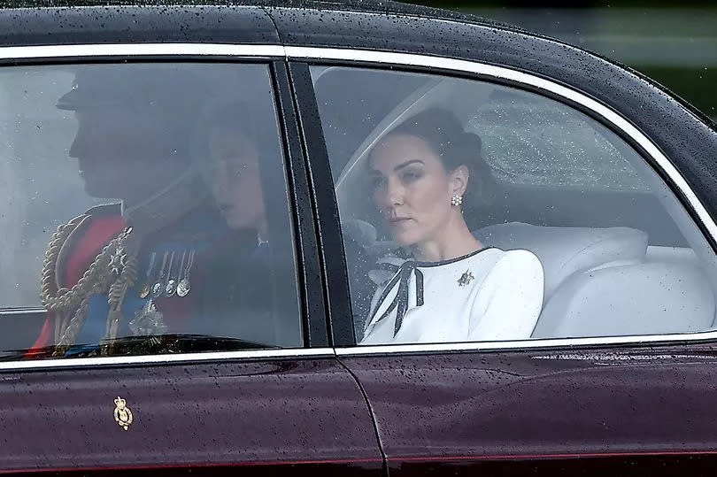 Britain's Catherine, Princess of Wales, (R) arrives with Britain's Prince William, Prince of Wales, (L) and Britain's Prince George of Wales (C) to Buckingham Palace before the King's Birthday Parade "Trooping the Colour" in London on June 15, 2024