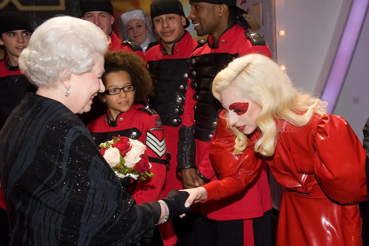 The Queen meets Lady Gaga (Leon Neal/PA) (PA Archive)