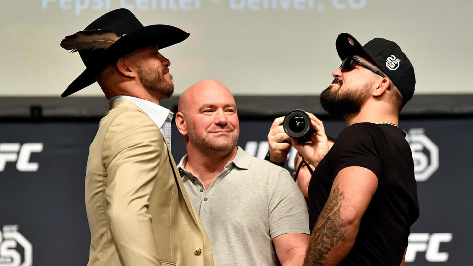 Opponents Donald ‘Cowboy’ Cerrone and Mike Perry face off during the UFC press conference inside the Orpheum Theater on August 3, 2018 in Los Angeles, California. (Photo by Jeff Bottari/Zuffa LLC/Zuffa LLC via Getty Images)