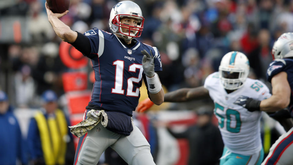 Mandatory Credit: Photo by AP/REX/Shutterstock (9240828f)Tom Brady, Andre Branch.