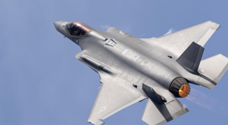 Close top view of a Lockheed Martin (LMT) F-35C Lightning II with afterburner on