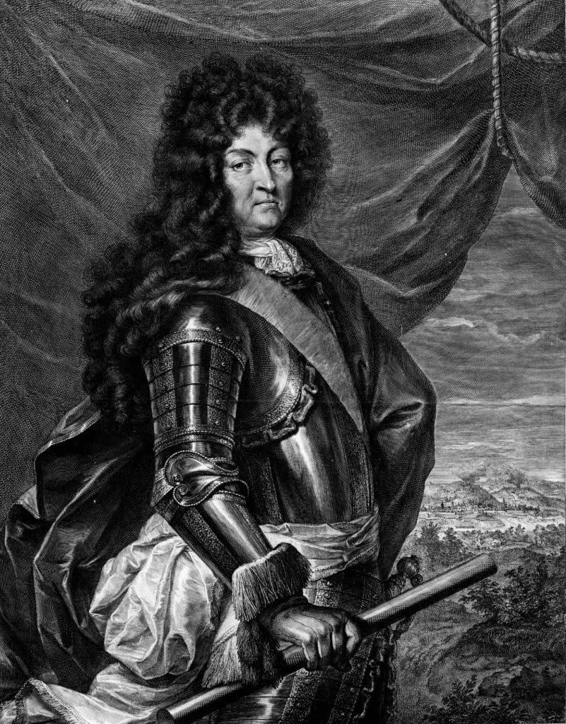 A man with long curly hair is depicted in historical armor, holding a baton, against a backdrop of a tent and open landscape