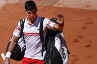 <p>Novak Djokovic à son arrivée sur le court central.</p>