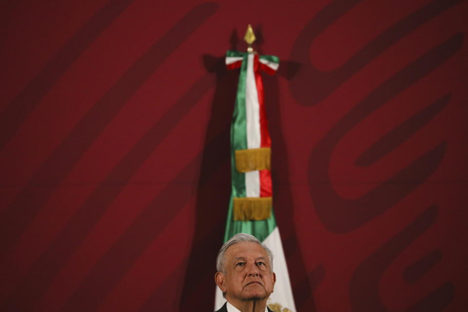 Mexico's President Andres Manuel Lopez Obrador gives his daily news conference at the presidential palace in Mexico City, early Thursday, March 19, 2020. (AP Photo/Fernando Llano)