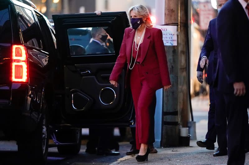 Dr. Jill Biden walks to a vehicle as she departs from Biden transition headquarters in Wilmington, Delaware