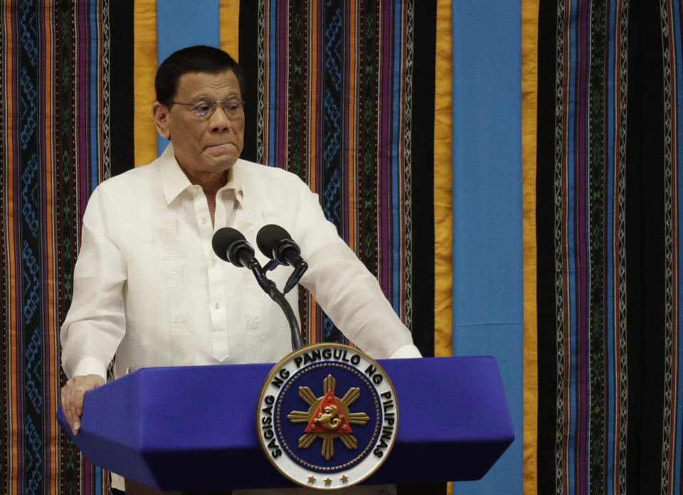 Philippine President Rodrigo Duterte pauses 4th State of during his 4th State of the Nation Address at the House of Representatives in Quezon city, metropolitan Manila, Philippines Monday July 22, 2019. (AP Photo/Aaron Favila)