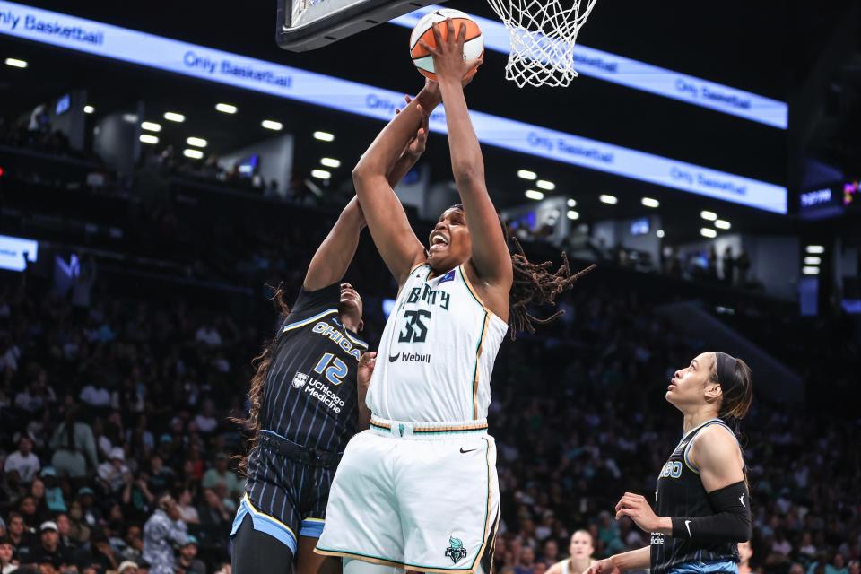 Sky forward Michaela Onyenwere (12) and Liberty forward Jonquel Jones (35) fight for a rebound during the second quarter at Barclays Center in Brooklyn, New York on May 23, 2024.