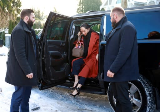 Huawei executive Meng Wanzhou, whom the US has accused of fraud, exits her vehicle at her home after her court appearance on January 17, 2020 in Vancouver, Canada