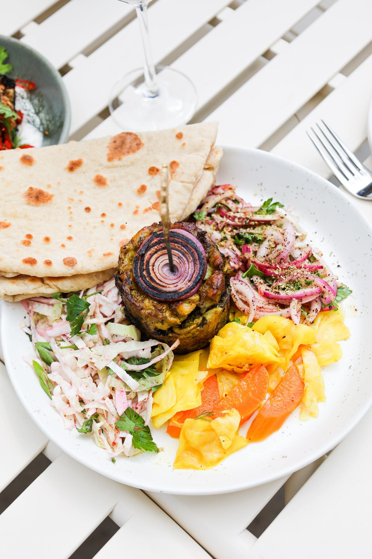 The chicken shawarma at Ezov comes with pickled vegetables that help cut the savoriness of the meat.