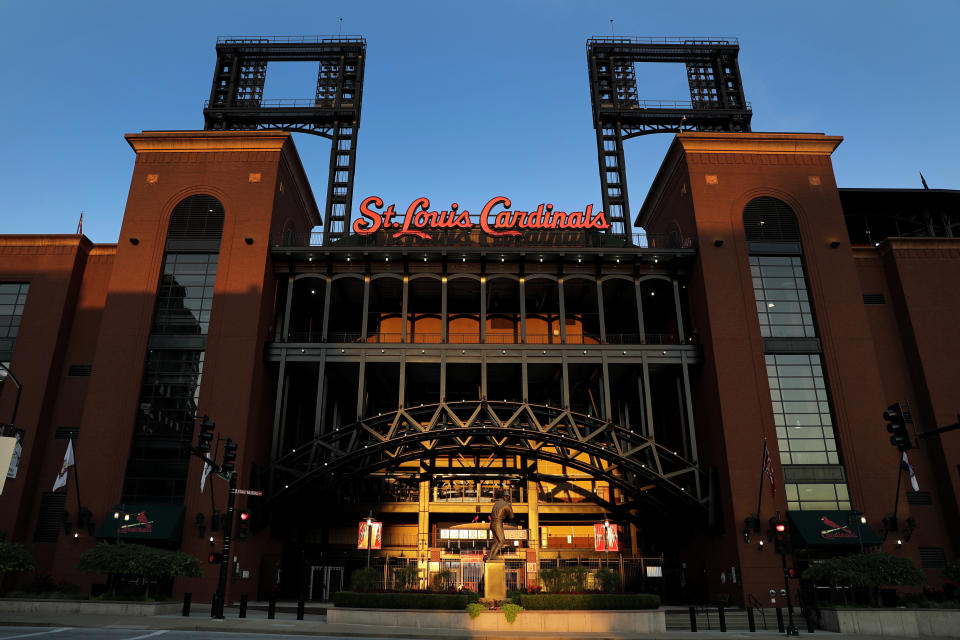 Busch Stadium, home of the St. Louis Cardinals, remains quiet Friday, Aug. 7, 2020, in St. Louis. Major League Baseball announced Friday night that the entire three-game series between the Chicago Cubs and Cardinals set for this weekend in St. Louis has been postponed after two more Cardinals players and a staff member tested positive for the coronavirus. (AP Photo/Jeff Roberson)