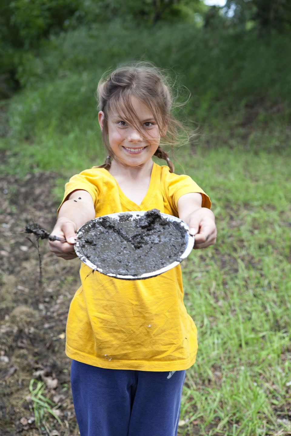 girl with mud pie fun activities for kids