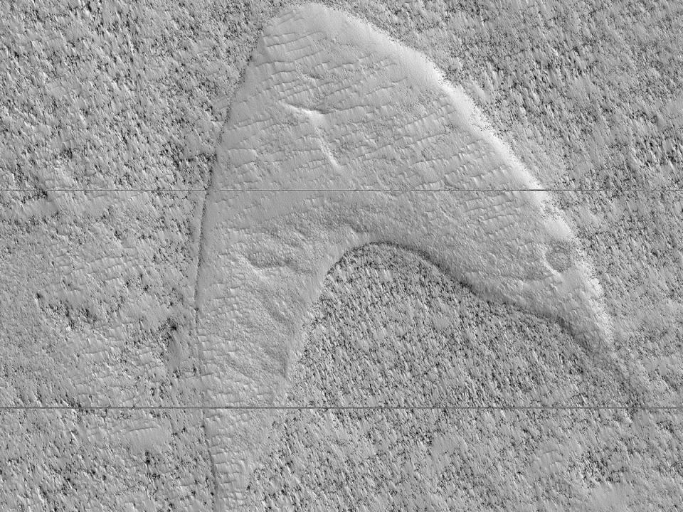 A dune cast, or ghost dune, on Mars that looks strikingly similar to the "Star Trek" Starfleet logo. (Photo: NASA/JPL/University of Arizona)